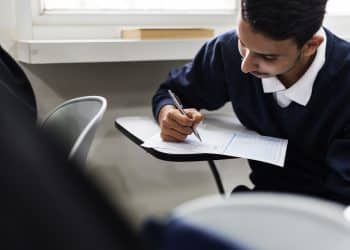 Young muslim student in class