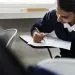 Young muslim student in class