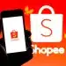 Logo da Shopee exibido em um celular, com fundo vermelho e a marca ao fundo, representando o trabalho na shopee