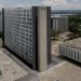 Fachada do prédio do Superior Tribunal Militar (STM) em Brasília, com outros edifícios governamentais ao fundo.