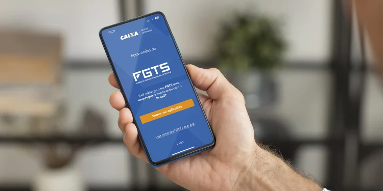 Imagem do aplicativo FGTS da Caixa Econômica Federal na tela de um celular. Lucro do fgts de 2024 aprovado.